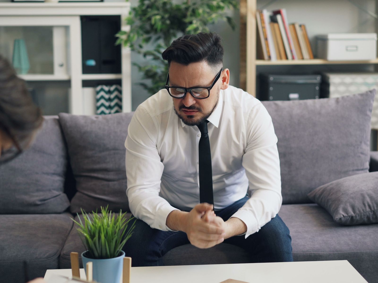 A client talking with a therapist during a session